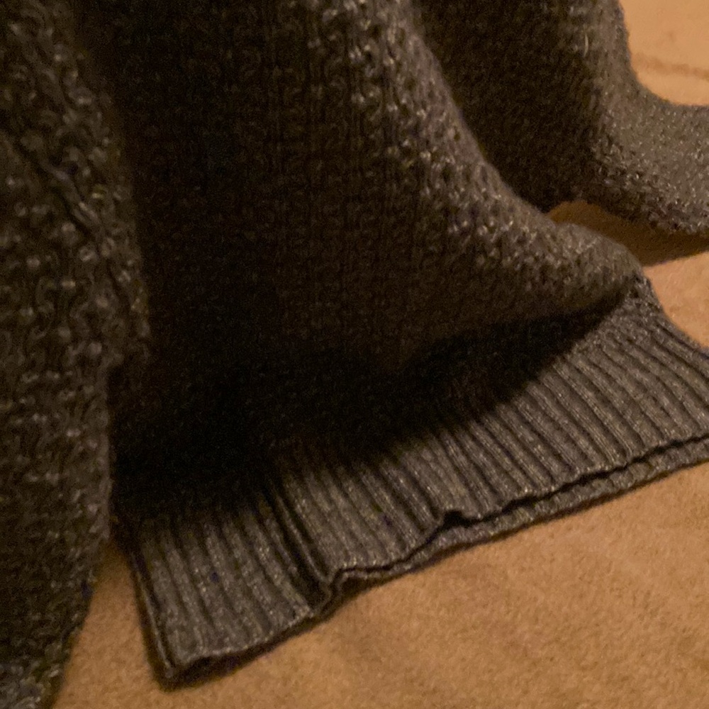 Charcoal grey . runs small hand made . To short for tall people